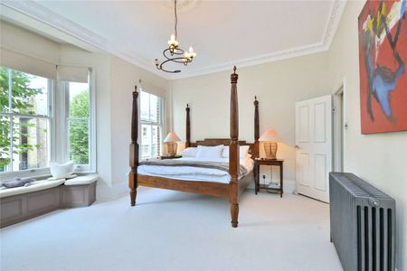 A beautifully presented four-five bedroom house situated on an elegant tree lined road. - Photo 2