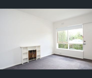 SECURE ONE-BEDROOM APARTMENT WITH PRIVATE COURTYARD & PARKING! - Photo 1