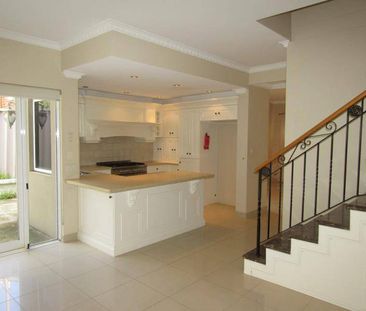 Two-Storey Home in a Prime Location - Photo 1