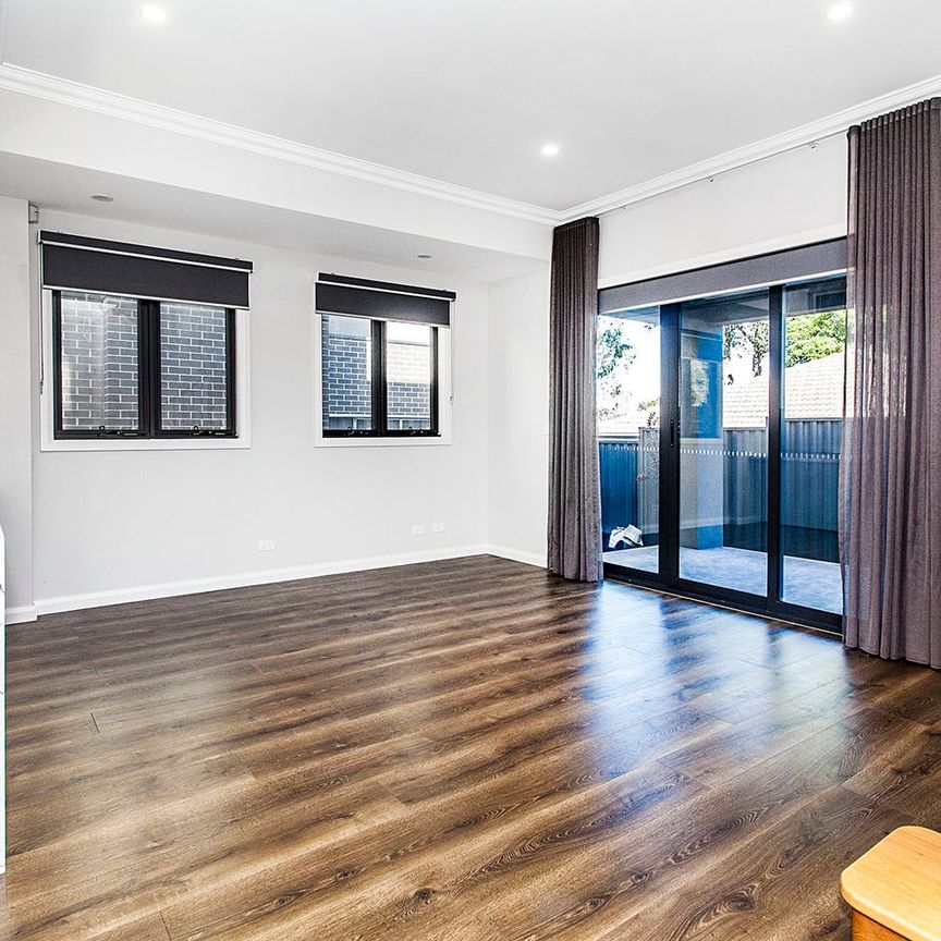 Low maintenance, modern living - Photo 1