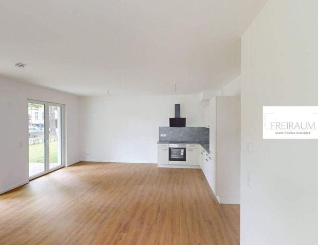 EXKLUSIVES WOHNEN: Geräumige 3-Zimmer-Wohnung mit TERRASSE und EBK im Weißenseer Neubauquartier FREIRAUM - Foto 1