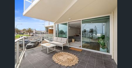 Beachfront Living with Modern Comfort - Photo 2