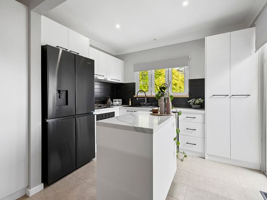 Beautifully Renovated 3 Bedroom Home - Photo 1