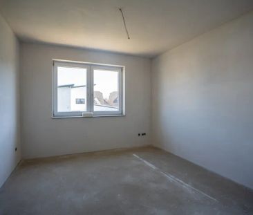 Eine Neubauwohnung mit einem sehr großen Garten und einer tollen Te... - Photo 3