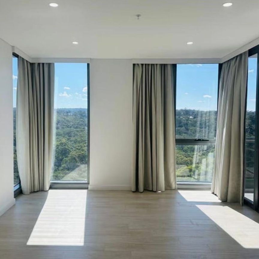 PREMIUM HIGH-RISE APARTMENTS SET WITHIN THE BESPOKE COMMUNITY OF MACQUARIE PARK - Photo 1