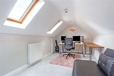 An immaculately presented four-bedroom detached family home with garaging. - Photo 3