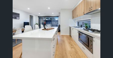 Modern Three-Bedroom Oasis in a Prime Seaside Location - Photo 2