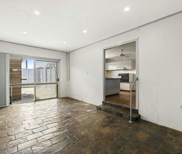 Spacious 4-Bedroom Family Home in Prime Location - Photo 1