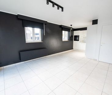 Volledig instapklaar gelijkvloers appartement met tuintje TE HUUR! - Foto 1