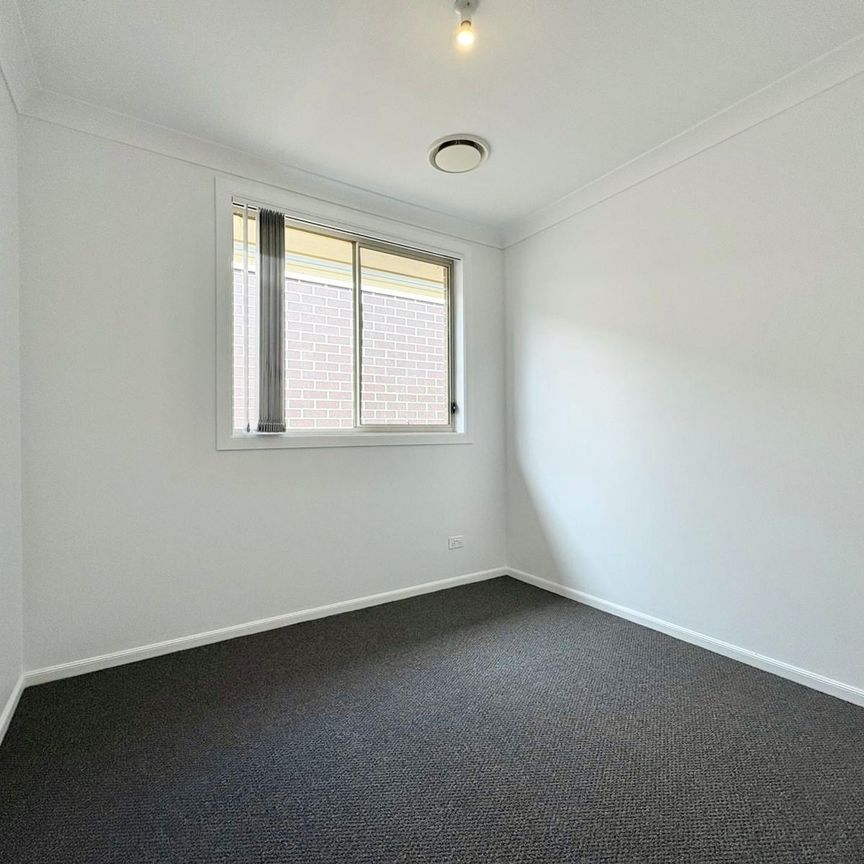 Modern Three Bedroom Home in Great Location! - Photo 1