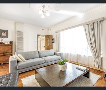 Charming Solid-Brick Home in Prime Location - Photo 1