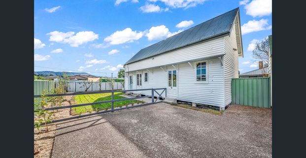 Charming fully furnished converted church inc lawn maintenance & water usage - Photo 1