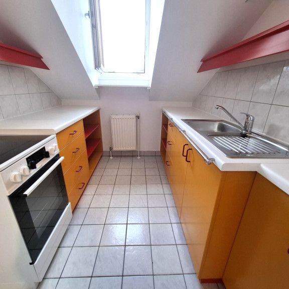 Dachgeschosswohnung in großartiger Lage - Foto 1