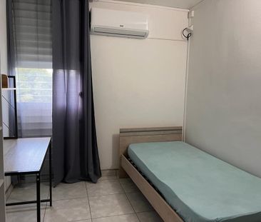 Location Appartement 5 pièces 71m² LES ABYMES 97139 - Photo 4