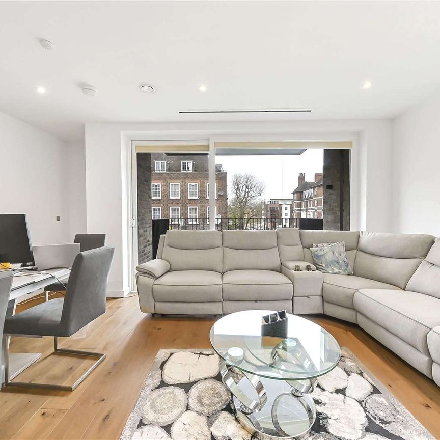 A bright three bedroom apartment in this modern Development - Photo 1