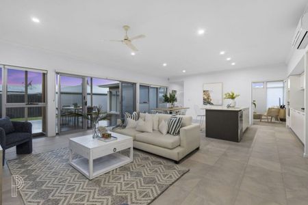 Elegant Family Living with Dual Zones & Private Alfresco in Wakerley - Photo 2