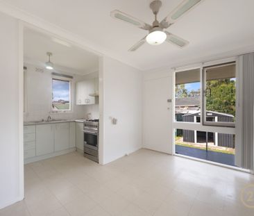 Comfortable Family Living with Spacious Backyard - Photo 4