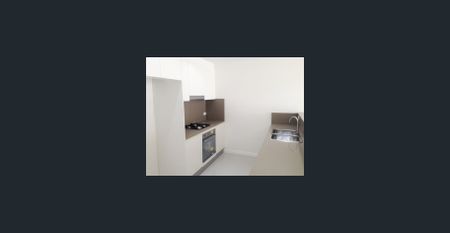 Split Level Modern 2 bedroom + Study - Photo 5