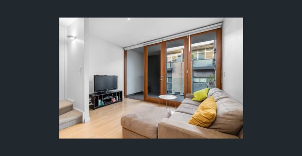 Trendy Near-New 3-Storey Townhouse in Prime City Location - Photo 1