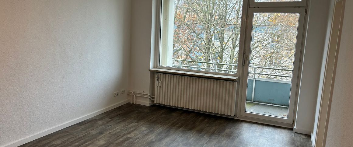 Schöne 3-Zimmer-Wohnung mit EBK und Balkon - Foto 1