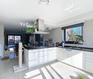 Ruim gelijkvloers appartement met 2 slaapkamers in Ophasselt - Photo 1