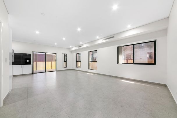 Spacious and Stylish Family Residence for Contemporary Living! - Photo 1