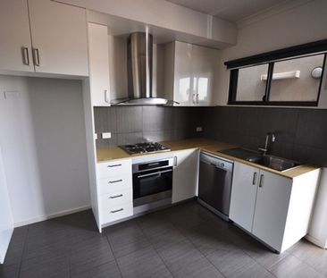 LOW MAINTENANCE - Upstairs 1x1 Modern Unit - Photo 6