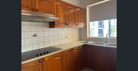 Spacious 3-Bedroom Unit in a Convenient Location - Photo 2