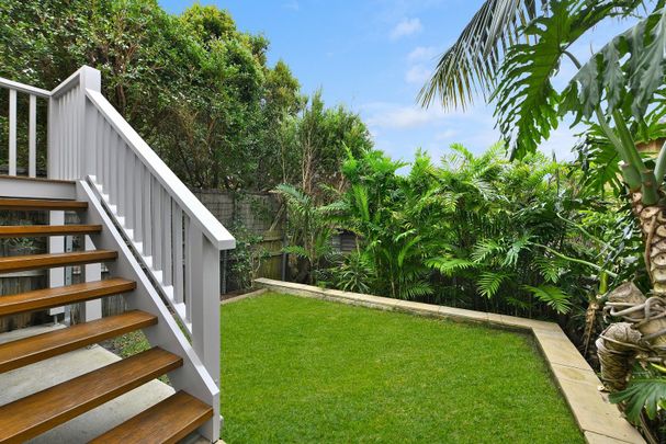 Lush Family Sanctuary with Stylish Renovation & City Views - Photo 1