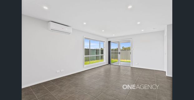 MODERN FAMILY HOME IN A PEACEFUL BADAGARANG LOCATION - Photo 1