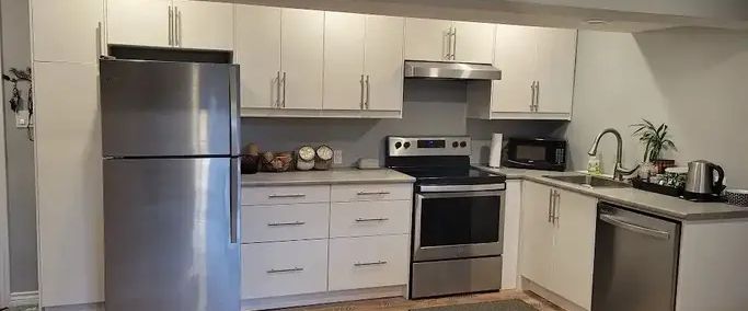 BRIGHT, SIX YEAR OLD, LEGAL 2-BED SUITE w/ PARKING | 128R Queen Alexandra close SE, Calgary - Photo 1