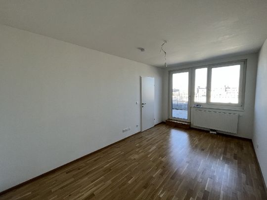 Helle 2-Zimmer-Wohnung mit großer Dachterrasse - Photo 1