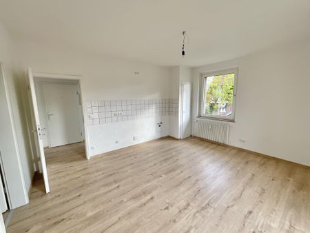 Helle 2-Zimmer-Wohnung mit Balkon, großer Küche und Tageslichtbad! - Foto 5