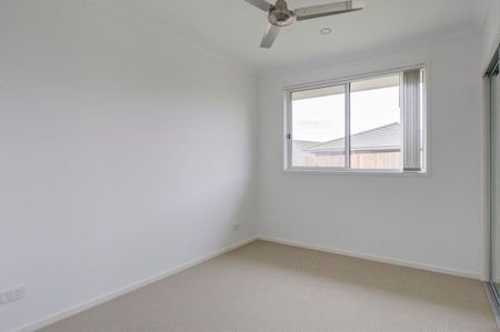 Modern and Well-Maintained Family Home in Prime Pimpama Location - Photo 2