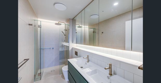 Modern Luxury Meets Homely Comfort in this Charming 2-Bedroom Rental in West Village! - Photo 1