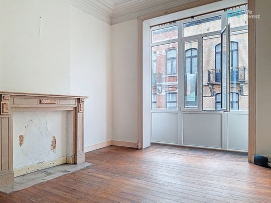 Appartement met één slaapkamer in Schaarbeek - Photo 1
