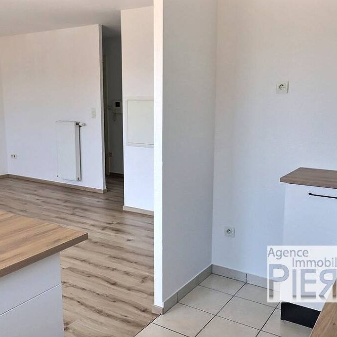 F3 de 65 m² avec terrasse et 2 places de parking dont une à l’intérieur - Photo 1