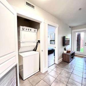 1bd plus den | Lakeshore with Walkout Patio and Green space - Photo 2