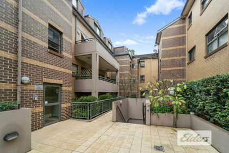 Modern Two-Bedroom Apartment in Central Flemington Location - Photo 2