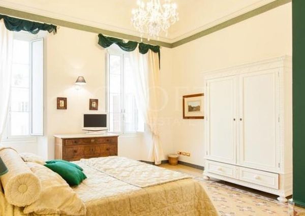 Center-Historic Jewish Quarter: Elegant apartment situated in beautiful Palazzo Nobiliare. Entrance, spacious living with original wood frescoed ceilings, large modern dining and kitchen, 4 bedrooms, 4 Baths, small terrace. #1527