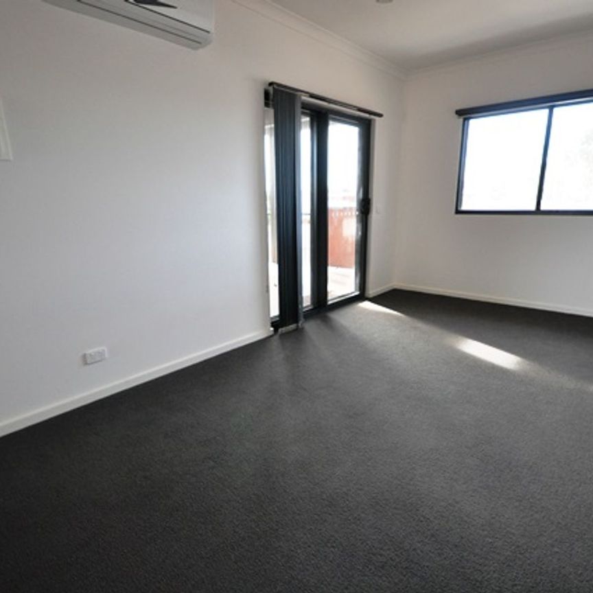 LOW MAINTENANCE - Upstairs 1x1 Modern Unit - Photo 1