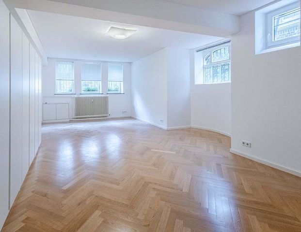 Exklusive Altbau-Wohnung mit Garten in besonders begehrter Wohnlage - Foto 1