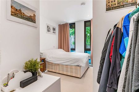 Bright two double bedroom flat with wooden floors and high standard fixtures in an extremely popular small new development on a side street near King's Cross. - Photo 5