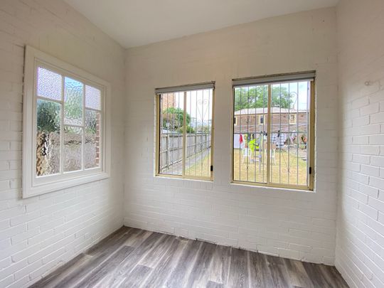 Renovated 2-Bedroom + Sunroom Apartment in Prime Location - Photo 1