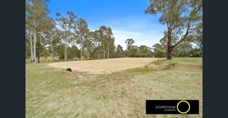 Beautiful Home with Bonus Granny Flat and Horse-Riding Arena in Jimboomba, QLD! - Photo 4