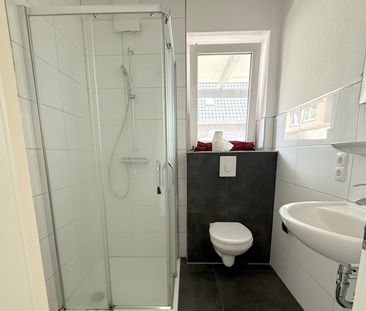 Attraktive 2-Zimmer-Erdgeschosswohnung mit Terrasse und Garten in b... - Photo 1