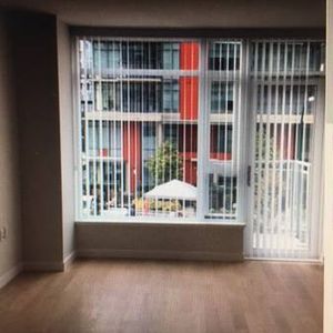 Olympic Village 1 bedroom, 1 den, 1 bathroom - Photo 2