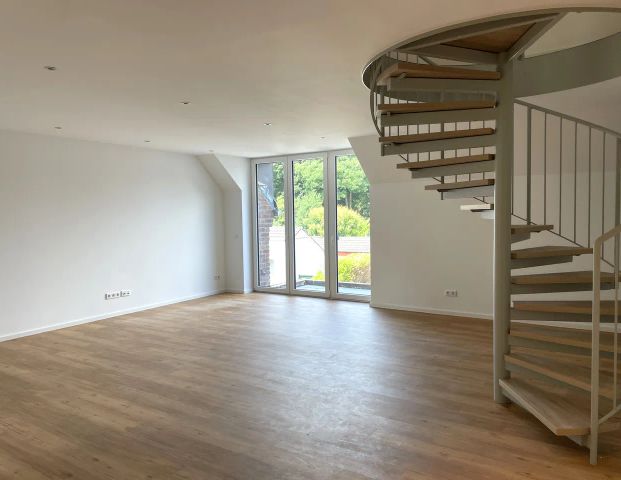 Erstbezug! Großzügige Maisonettewohnung am Kalkumer Schloss! - Foto 1