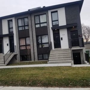 3½ moderne avec coin détente – Cuisine haut de gamme – Immeuble Récent – 810 pi² - Photo 2