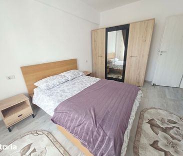 Inchiriez 2 camere decomandat cu parcare subterana zona Coresi - Photo 5